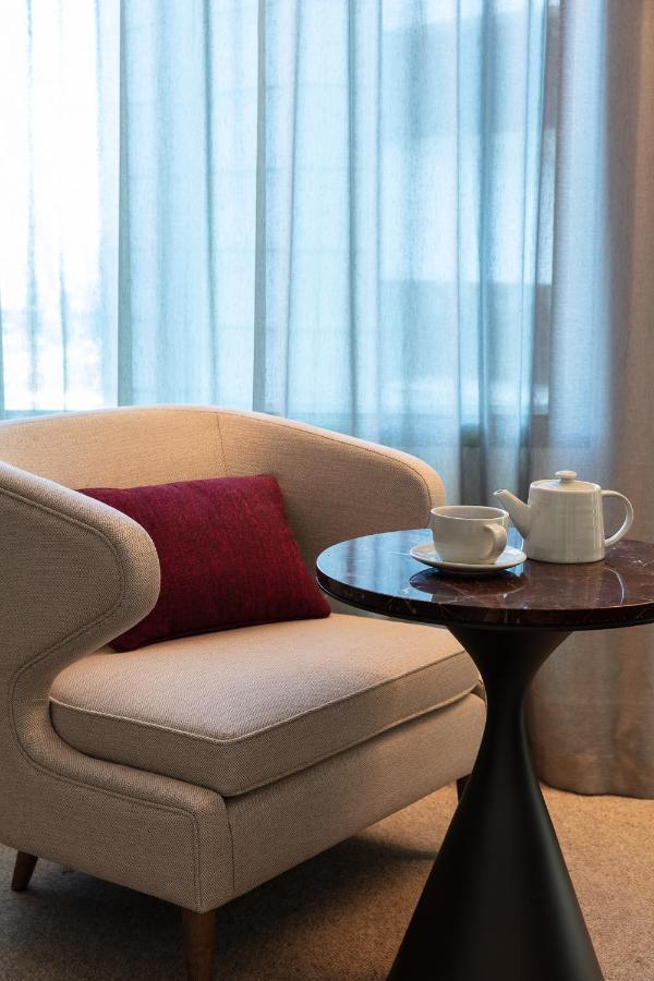 Next Hotel Melbourne, Curio Collection By Hilton المظهر الخارجي الصورة A tea set